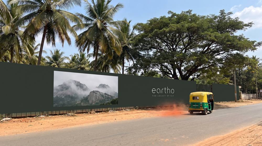 Eartho site hoarding beside a road