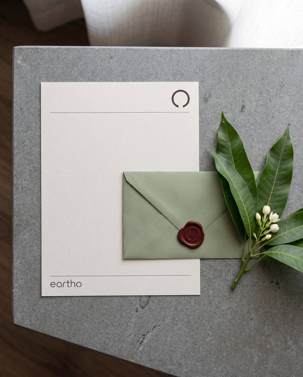 Eartho letterhead and sealed envelope